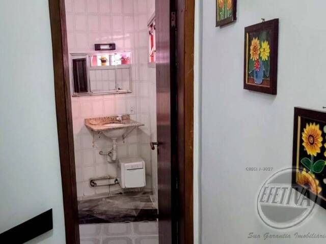 Sobrado para Venda em Centro - 32